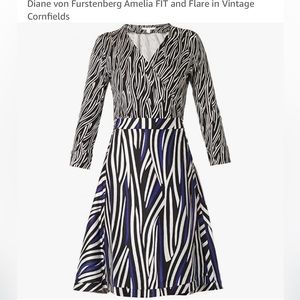 Diane von Furstenberg silk wrap dress never been worn in perfect condition.